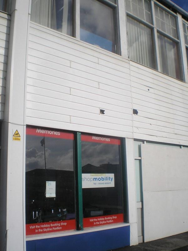 Shopmobility window along the back of the old reception building