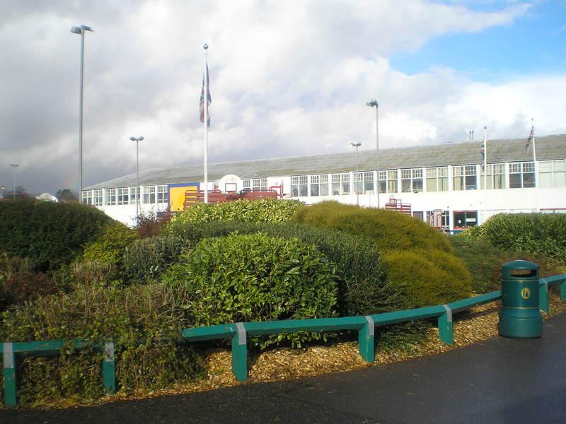 Looking across the greenery to the old reception building