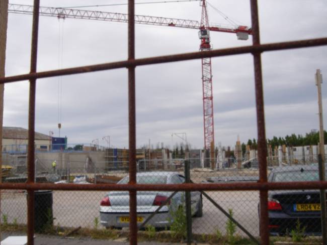 Looking through the fence at the new hotel building site