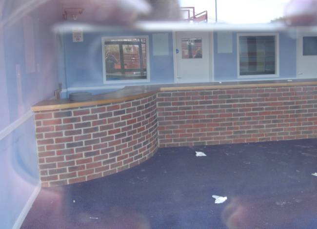 Looking through a window at the back of the old Reception Building