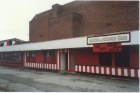 Shops at rear. The shop in the middle had a large serving hatch
