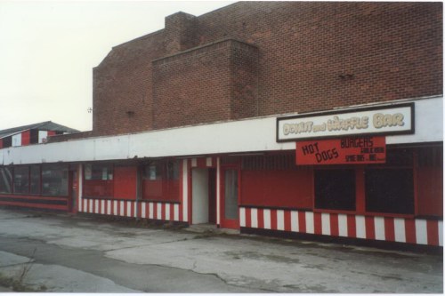 Shops at rear. The shop in the middle had a large serving hatch