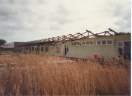 Side view of chalet row containing dining hall