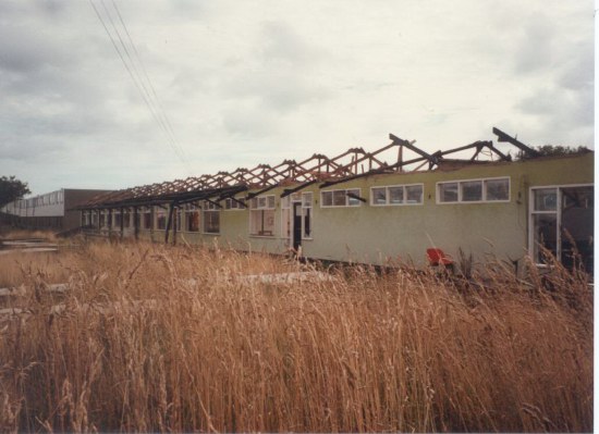 Side view of chalet row containing dining hall