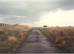 Beach road with Yellow camp on the left