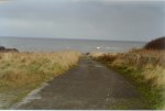The road leading down to the beach gate