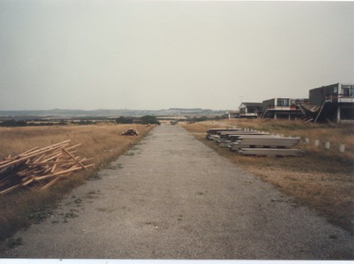 Blue Camp chalets on the right with the beach to the left